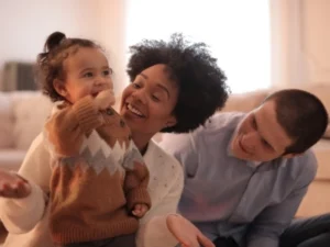 A husband and wife are spending time with their child while going through marriage counseling to tackle parenting issues.