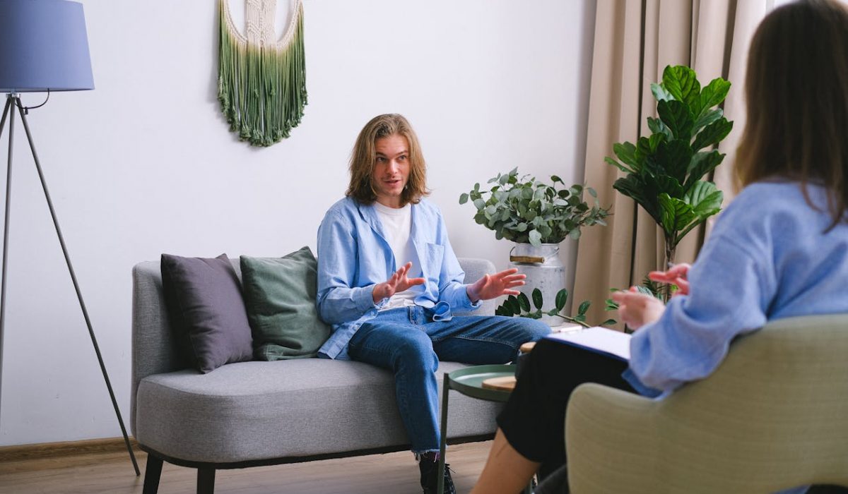 man-explaining-problems-to-faceless-psychologist